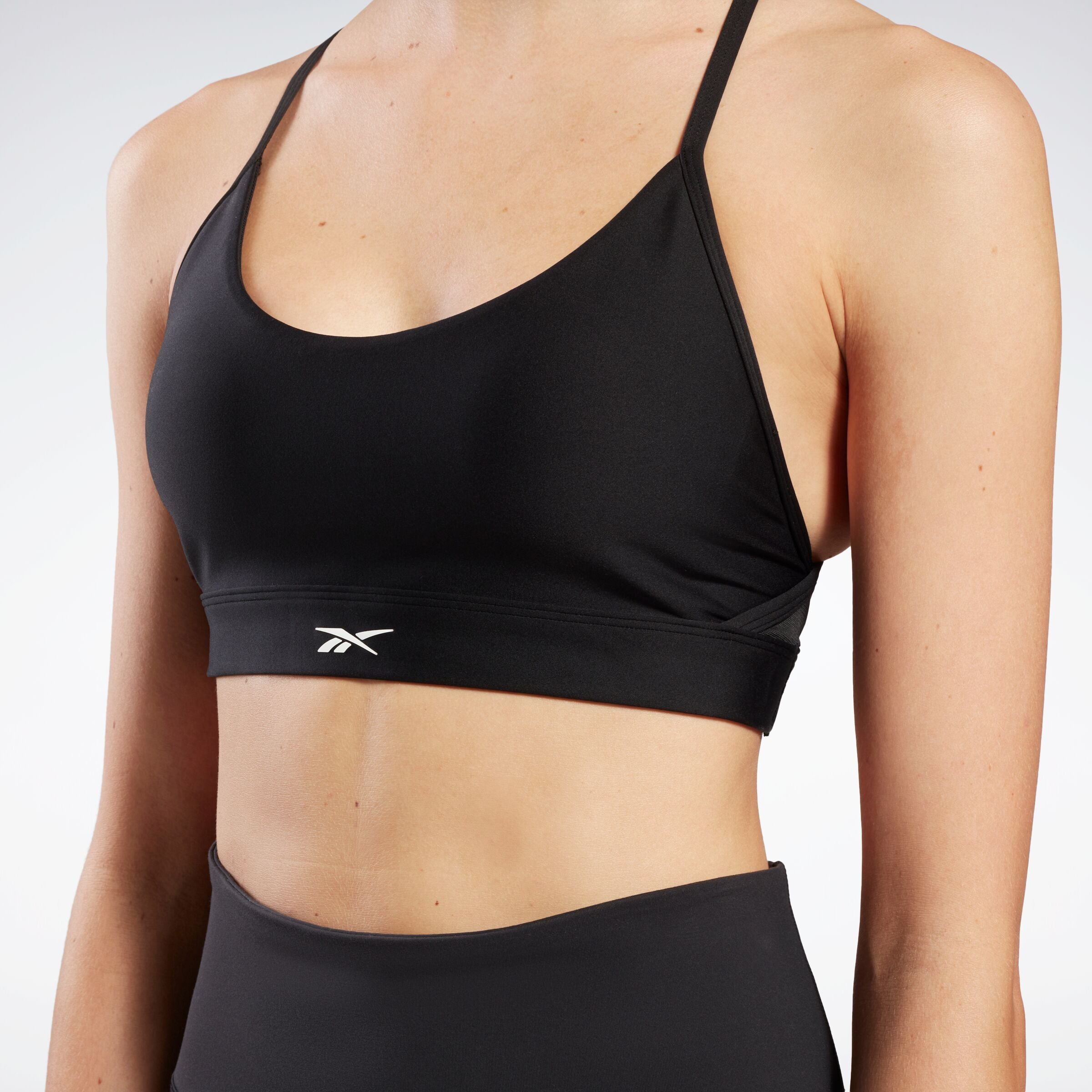 Reebok Women's Reebok Lux Strappy Sports Bra  In Black REG