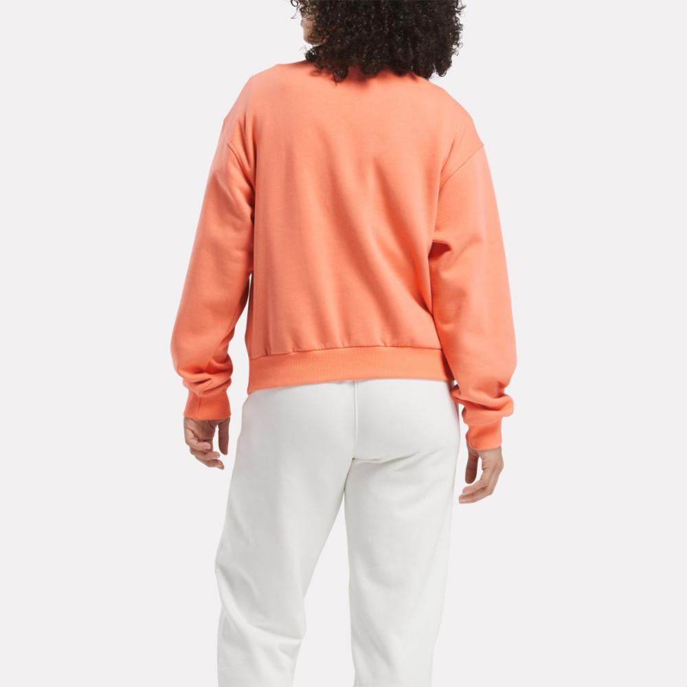 Reebok Apparel  Women's Q3 Ide Fleece Midlayer Reebok Training App Women Orange Reg