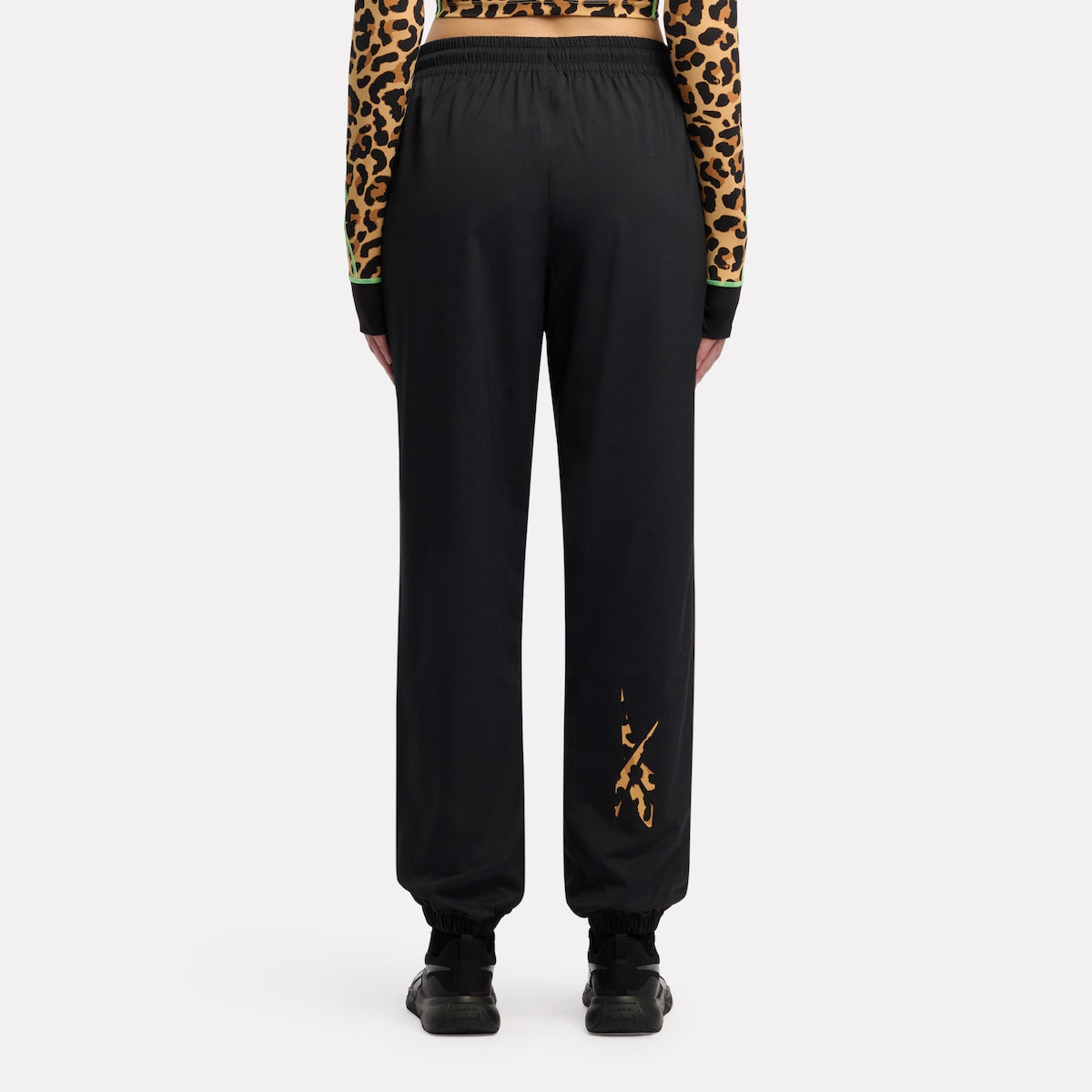 Reebok Women's Animal Print Vector Track Pant  In Black REG