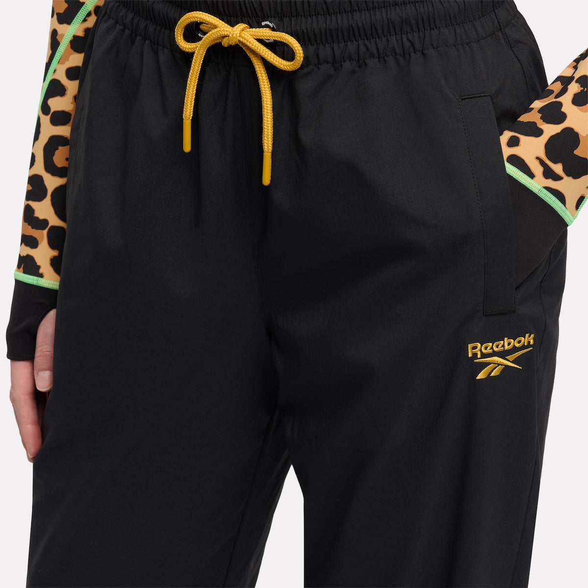 Reebok Women's Animal Print Vector Track Pant  In Black REG