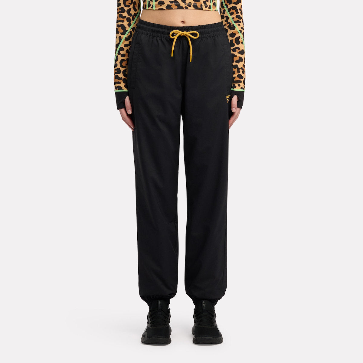 Reebok Women's Animal Print Vector Track Pant  In Black REG