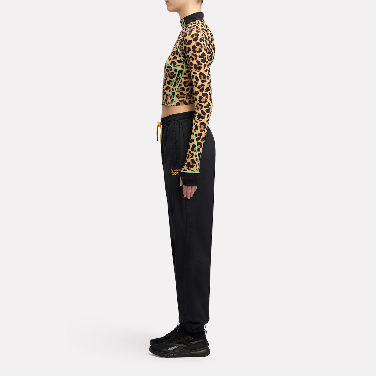 Reebok Women's Animal Print Vector Track Pant  In Black REG
