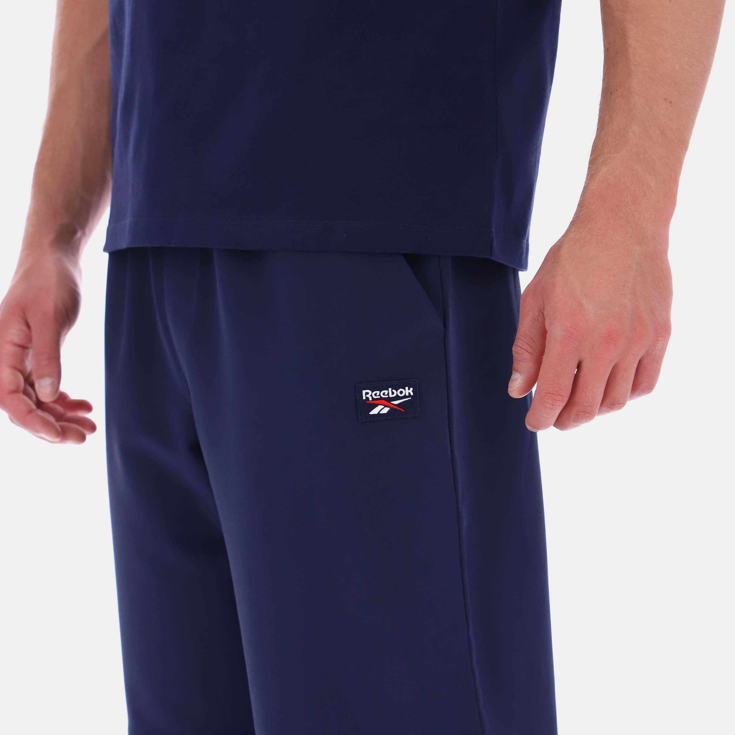 Reebok Men's Reece 4Way Stretch Pant  In Navy REG