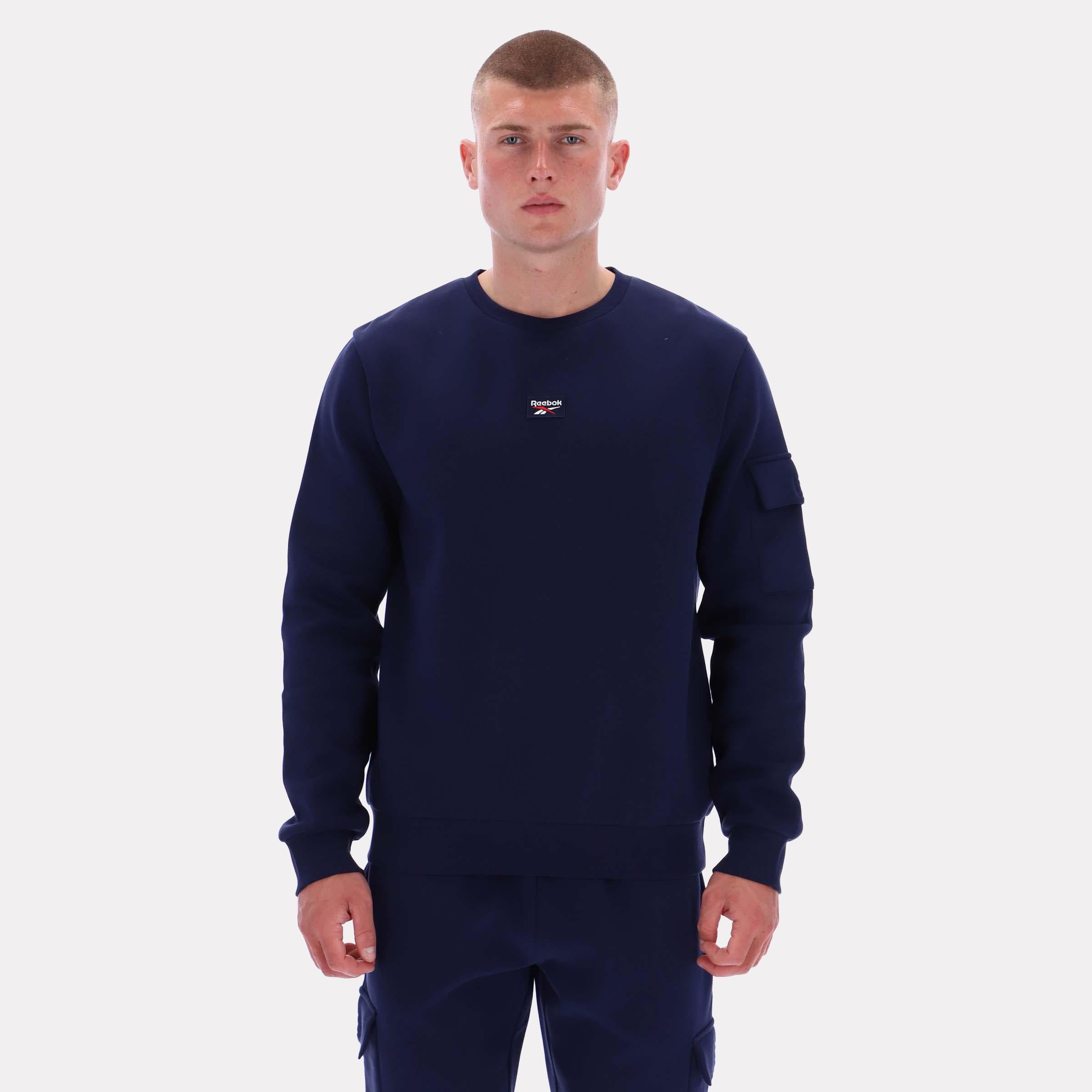 Reebok Apparel  Men's Peter Cargo Pocket Crewneck Sweatshirt Reebok Classics App Men Blue Reg