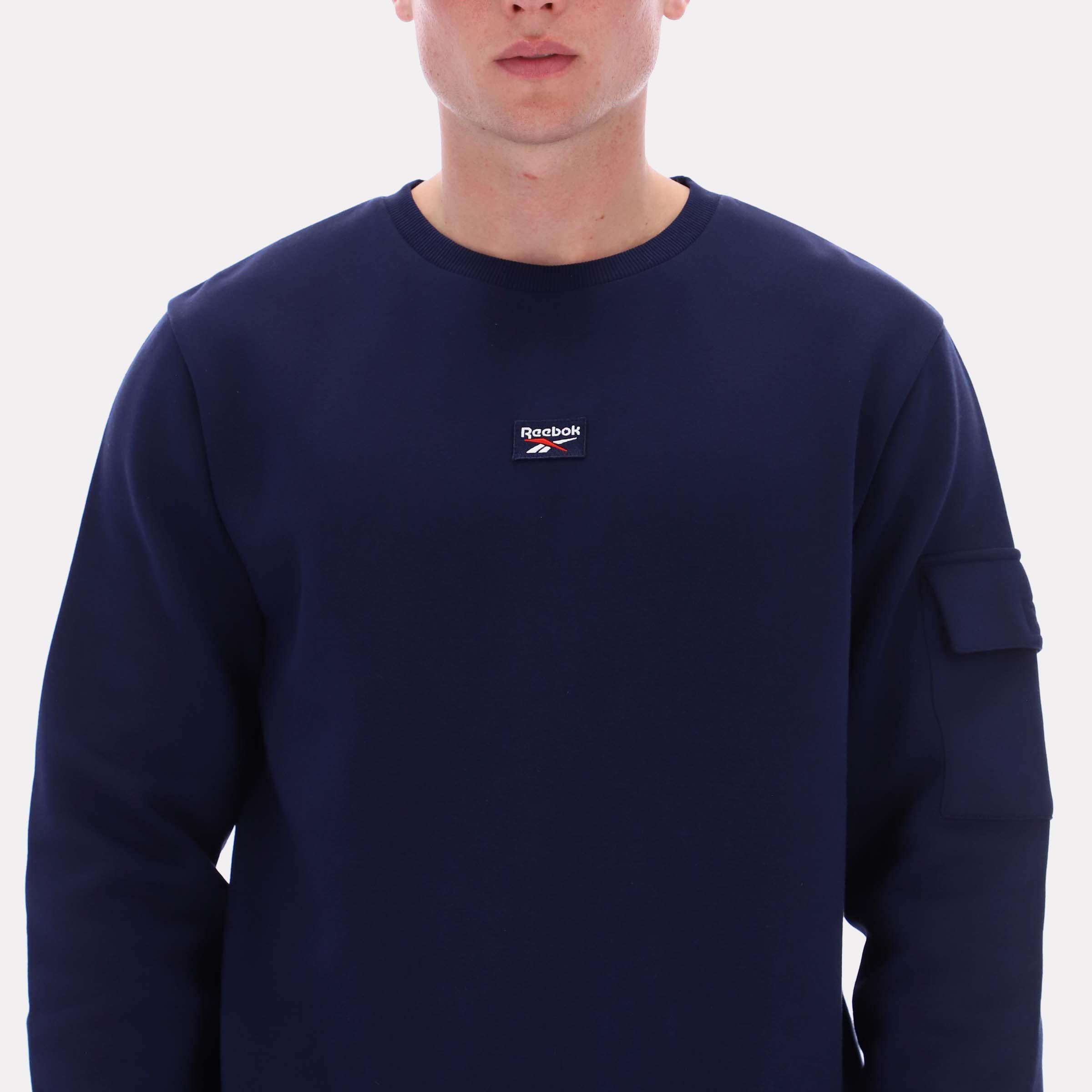 Reebok Apparel  Men's Peter Cargo Pocket Crewneck Sweatshirt Reebok Classics App Men Blue Reg
