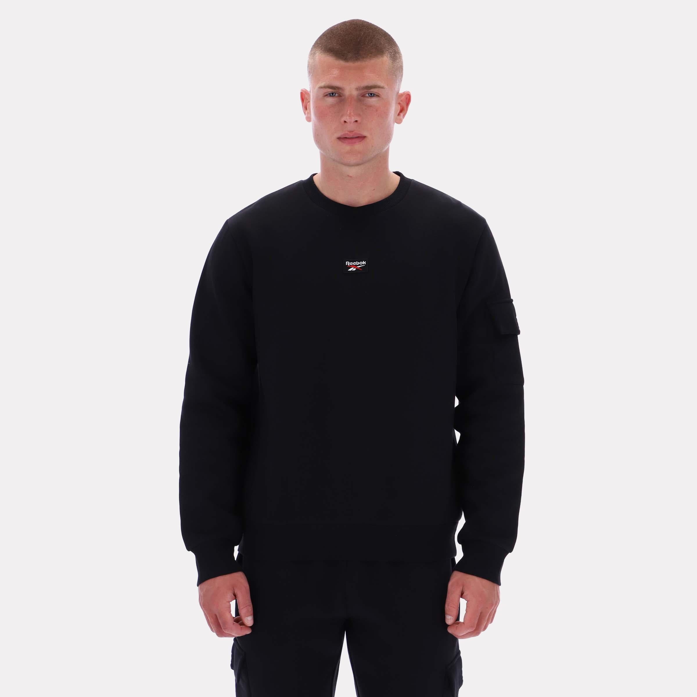 Reebok Apparel  Men's Peter Cargo Pocket Crewneck Sweatshirt Reebok Classics App Men Black Reg