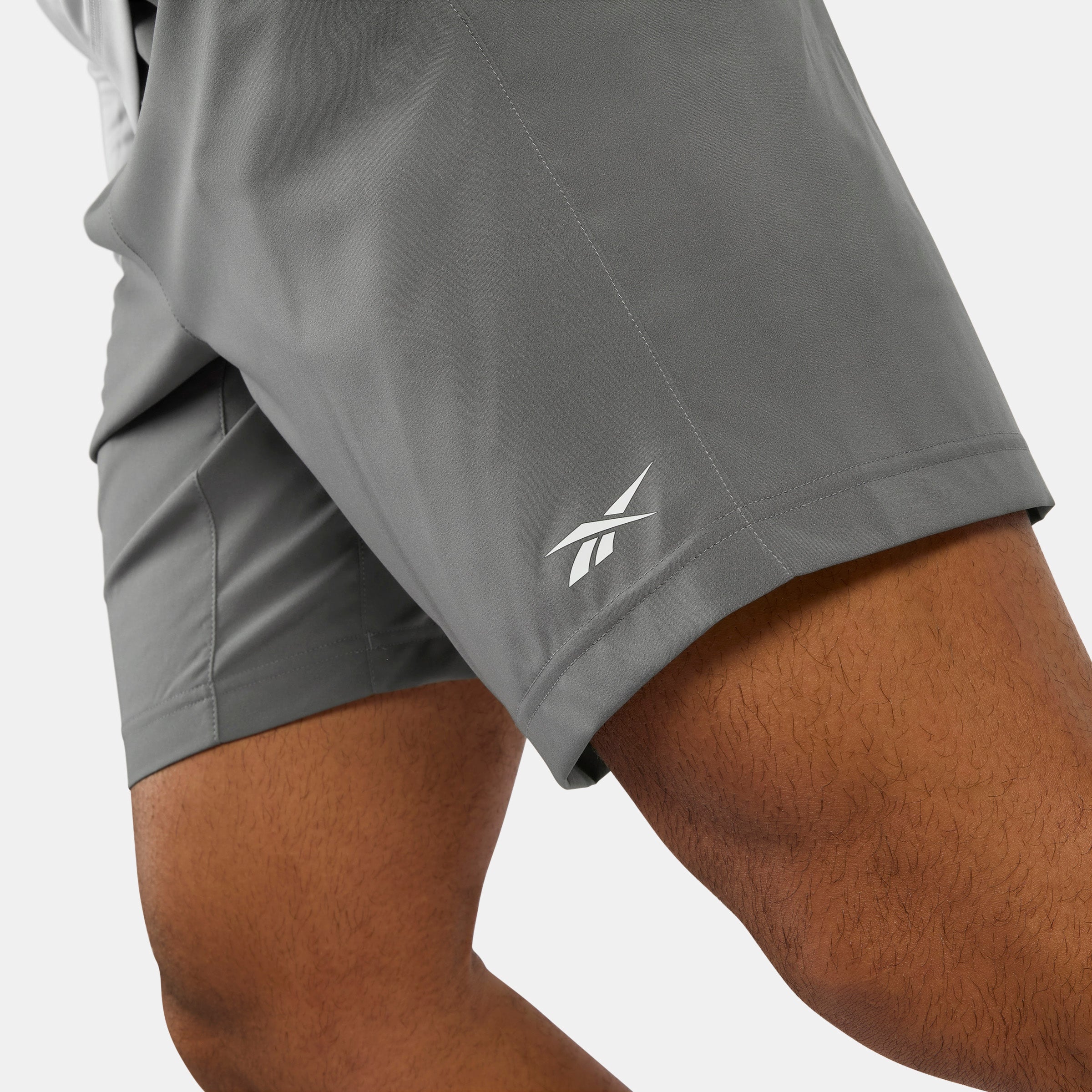 Reebok Men's Wor Woven Short  In Grey REG
