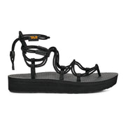 Black sandal with 'Teva' logo on a white background