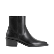 black leather pointed toe ankle boot on a white background