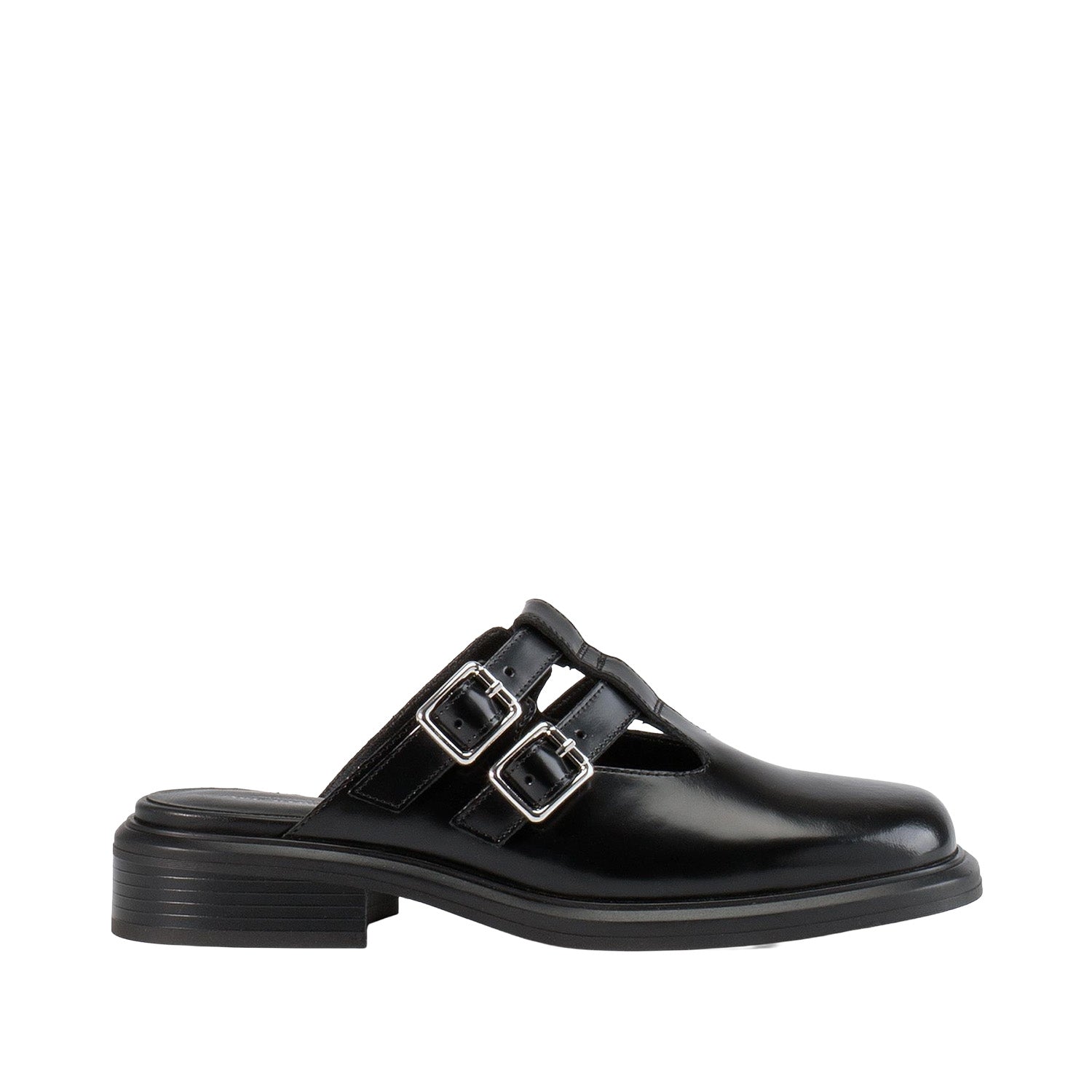 Black leather slip-on mule with double buckle detail and low heel. 