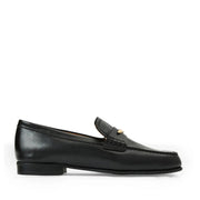 Black loafer shoe on a white background