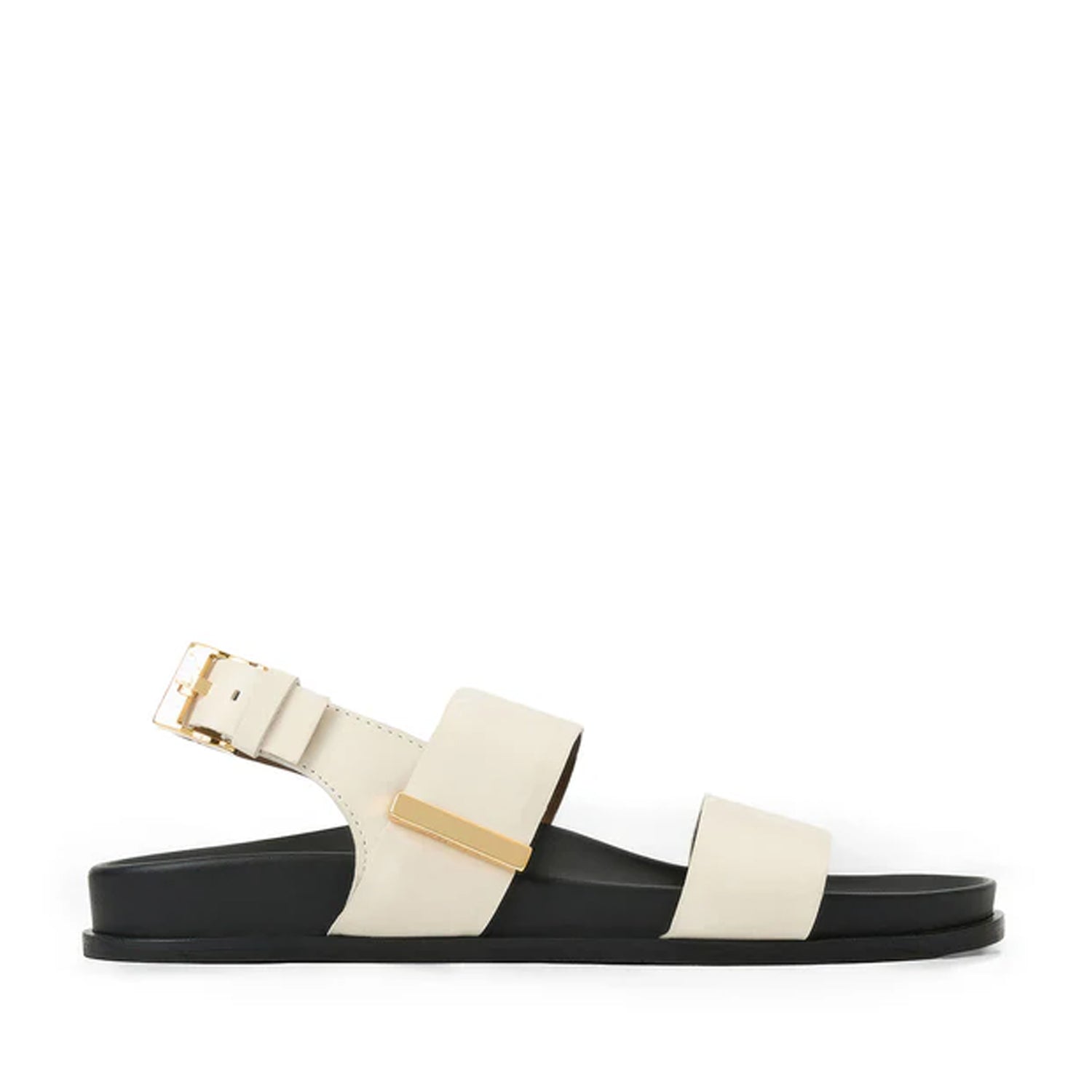 White sandal with black sole and gold accents on a white background