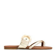 Gold sandal with a bow on a white background