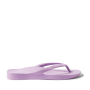 Lilac thong flip flops on a Lilac background