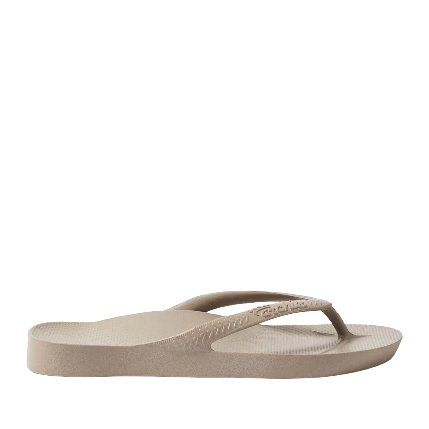 Taupe thong flip flops on a black background