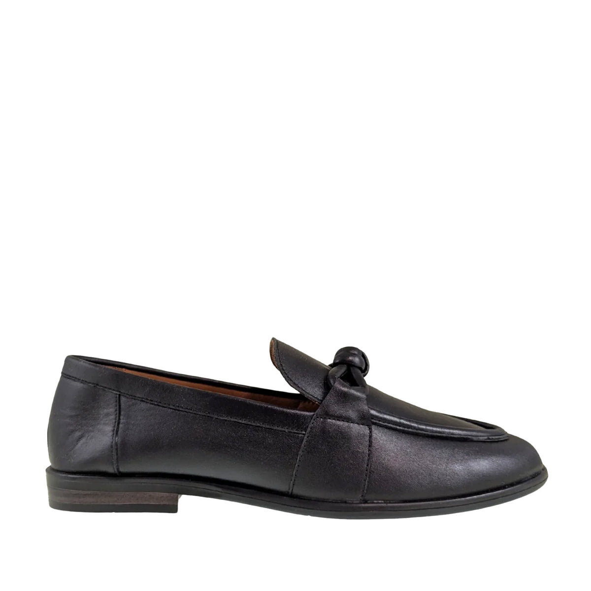 black leather loafer with knotted strap on a white background