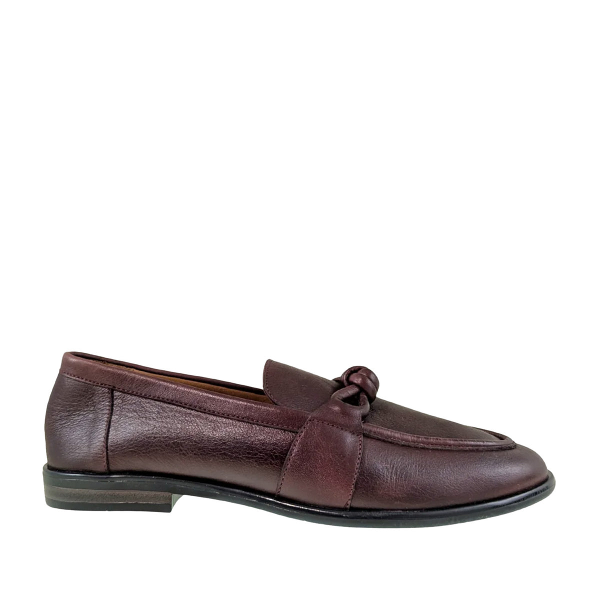burgundy leather loafer with knotted strap on a white background