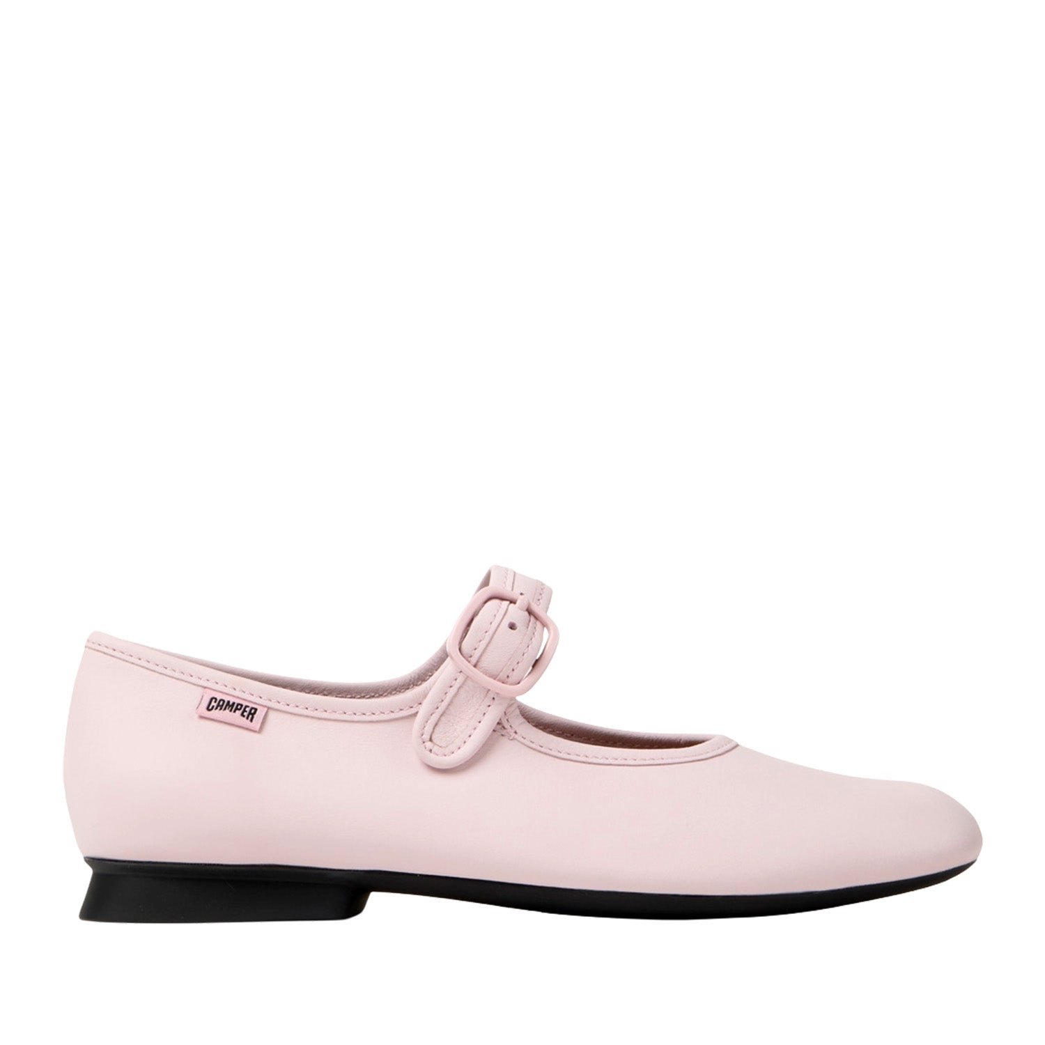 Light pink mary-jane flats with adjustable buckle on a white background.