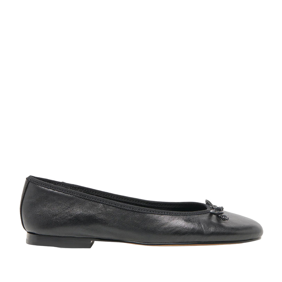 black leather ballet flat with bow detail on a white background