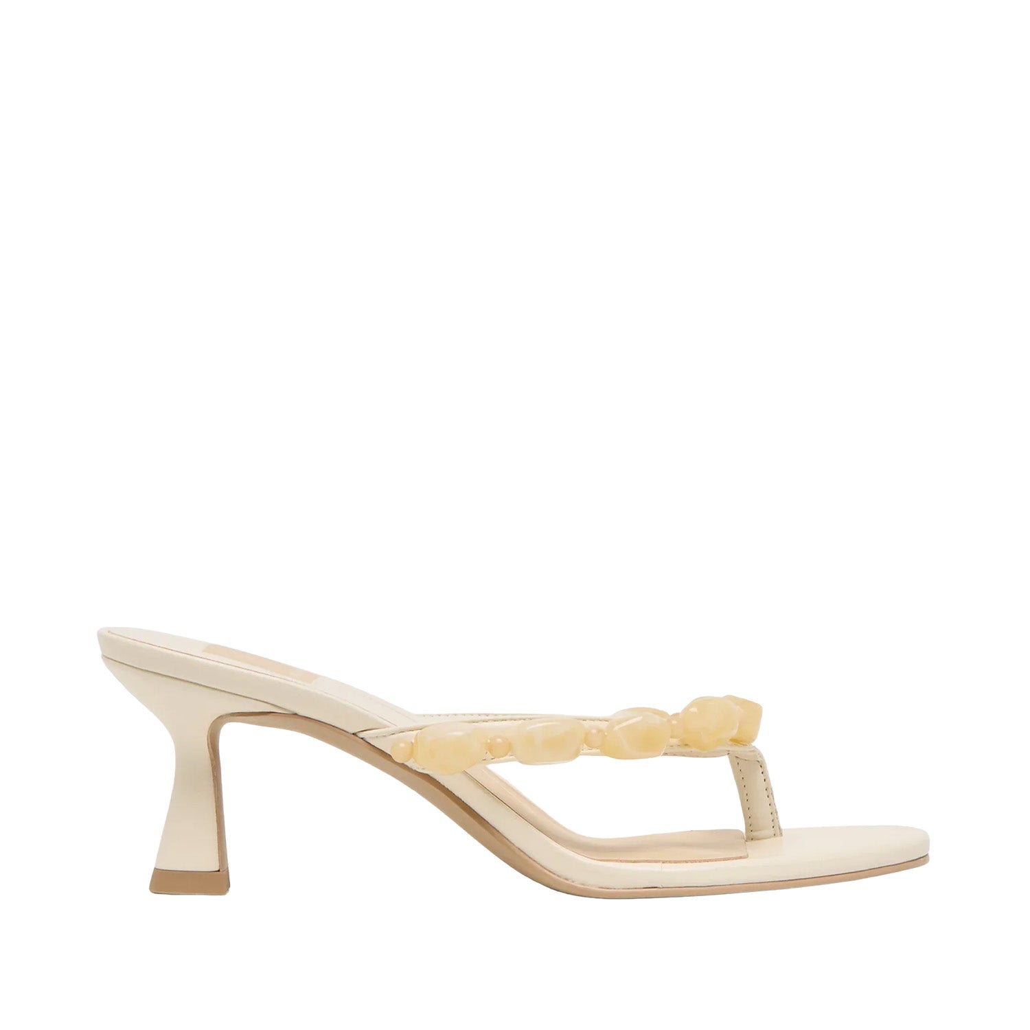 White kitten heel sandal with beige gem detail along op on white background