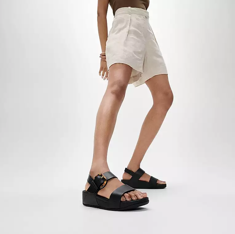 Fitflop Women's Lulu Resin Buckle Leather Back Strap Sandal in All Black