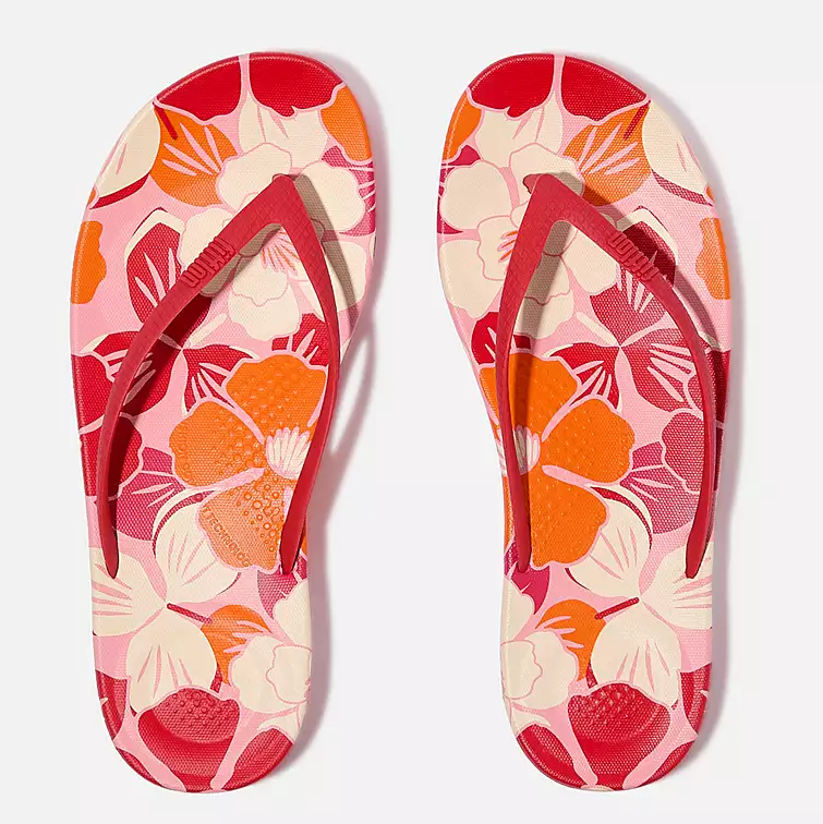 Red, pink and orange floral patterned toe-post flip-flop sandal. 