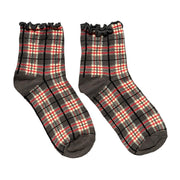 Plaid patterned socks on a white background