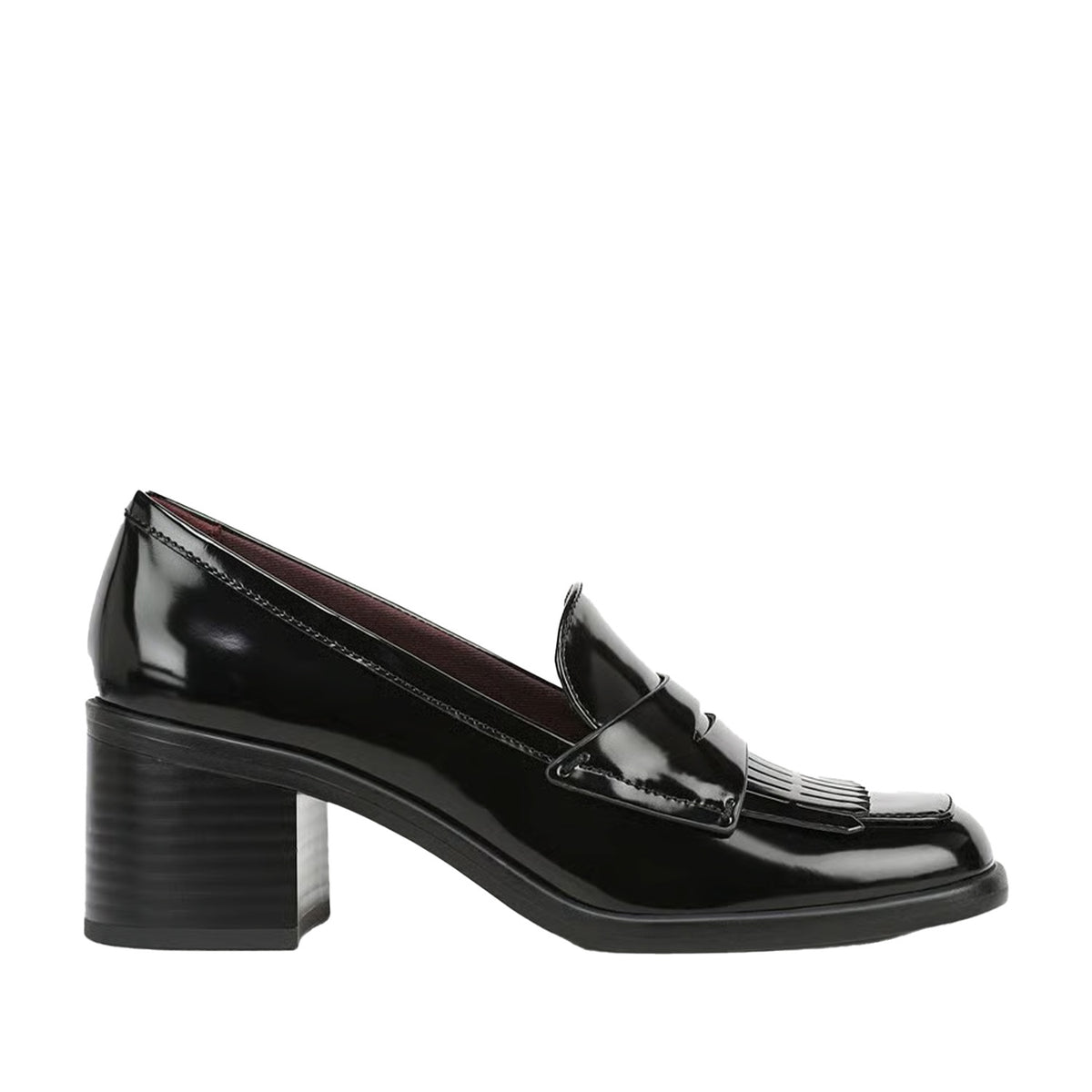 black heeled loafer on a white background