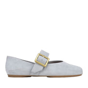Light blue suede mary-jane with an adjustable oversized buckle detail on a white background 