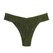 green lace thong on a white background