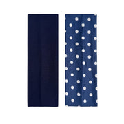 solid navy headband and navy headband with white polka dots on a white background