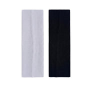 solid white headband and solid black headband on a white background