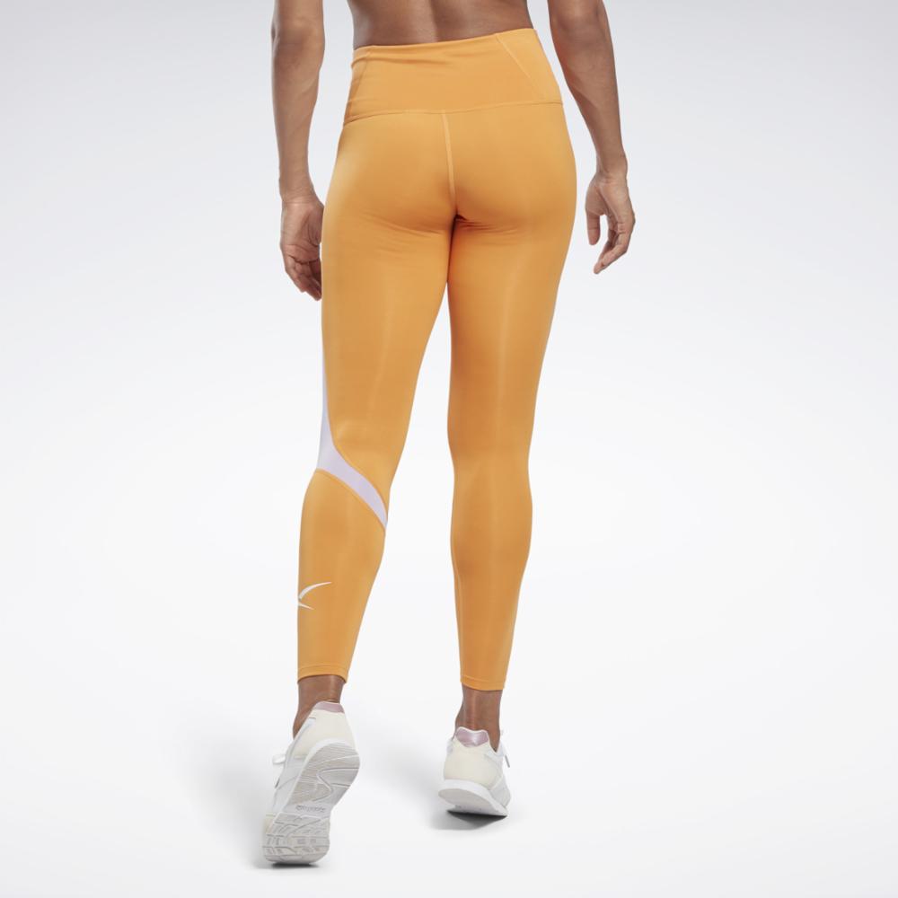 Reebok Apparel  Women's Wor Big Logo Tight Reebok Training App Women Orange Reg