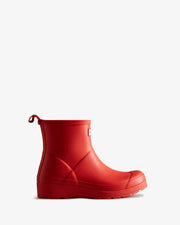 Red rain boot on a white background