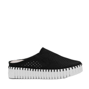Black slip-on mule sneaker with a textured sole on a white background