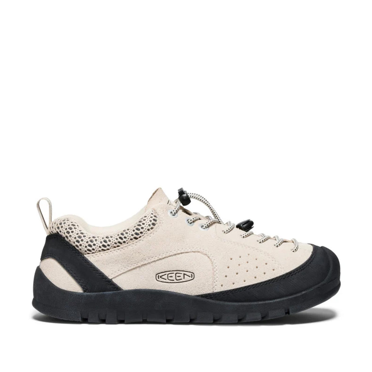 beige suede hiking sneaker with black detailing on a white background