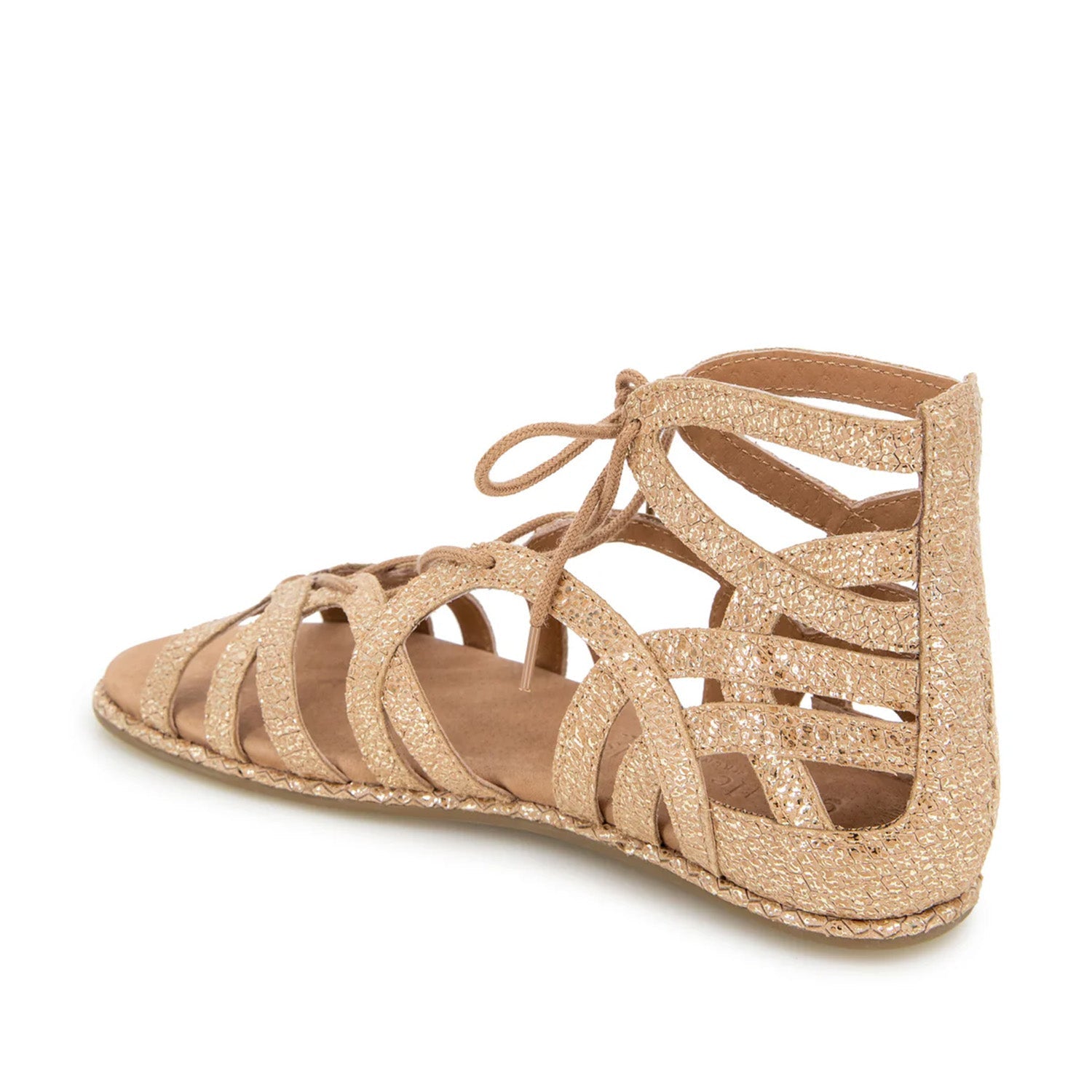 Gold speckled leather gladiator flat sandal with a lace-up detail. 