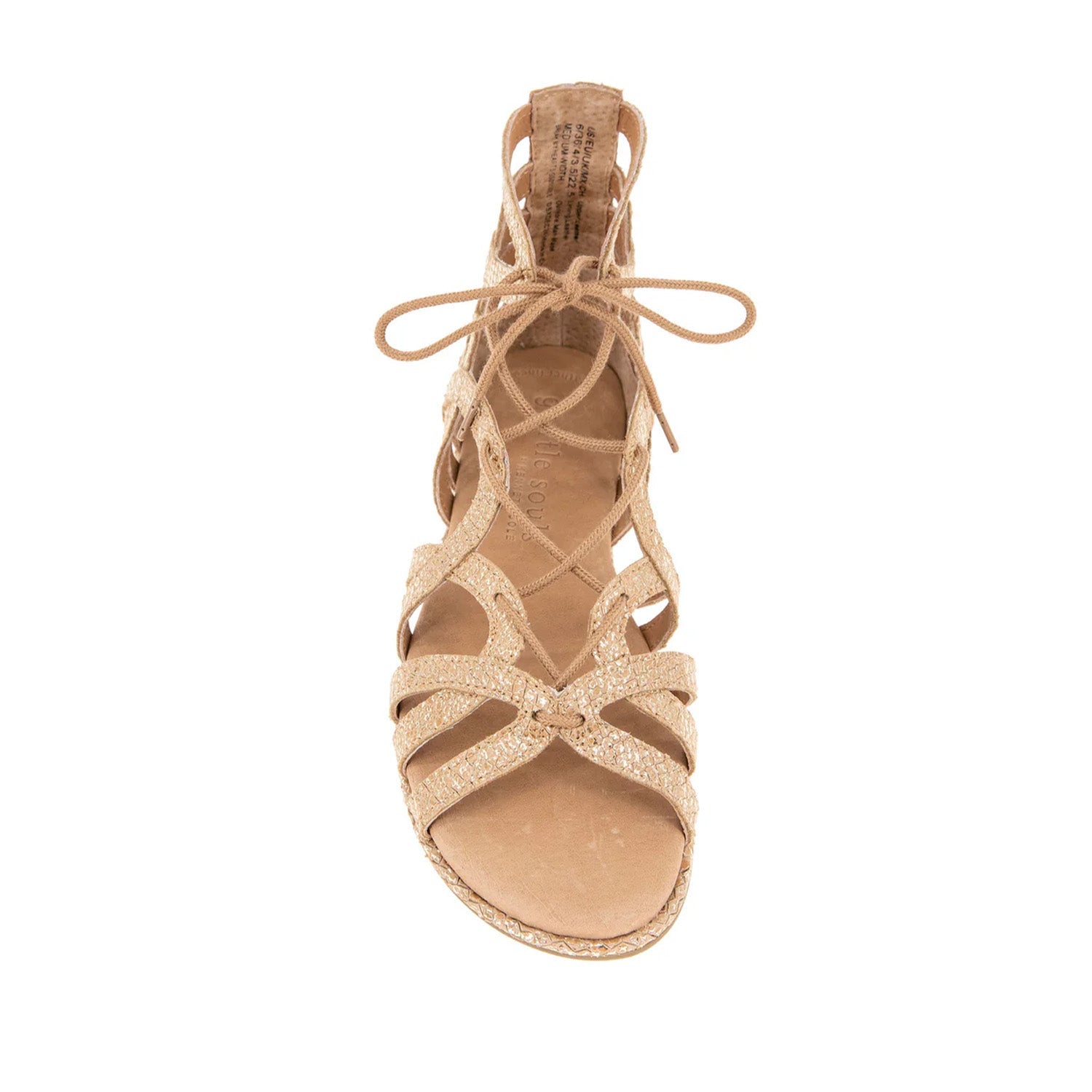 Gold speckled leather gladiator flat sandal with a lace-up detail. 