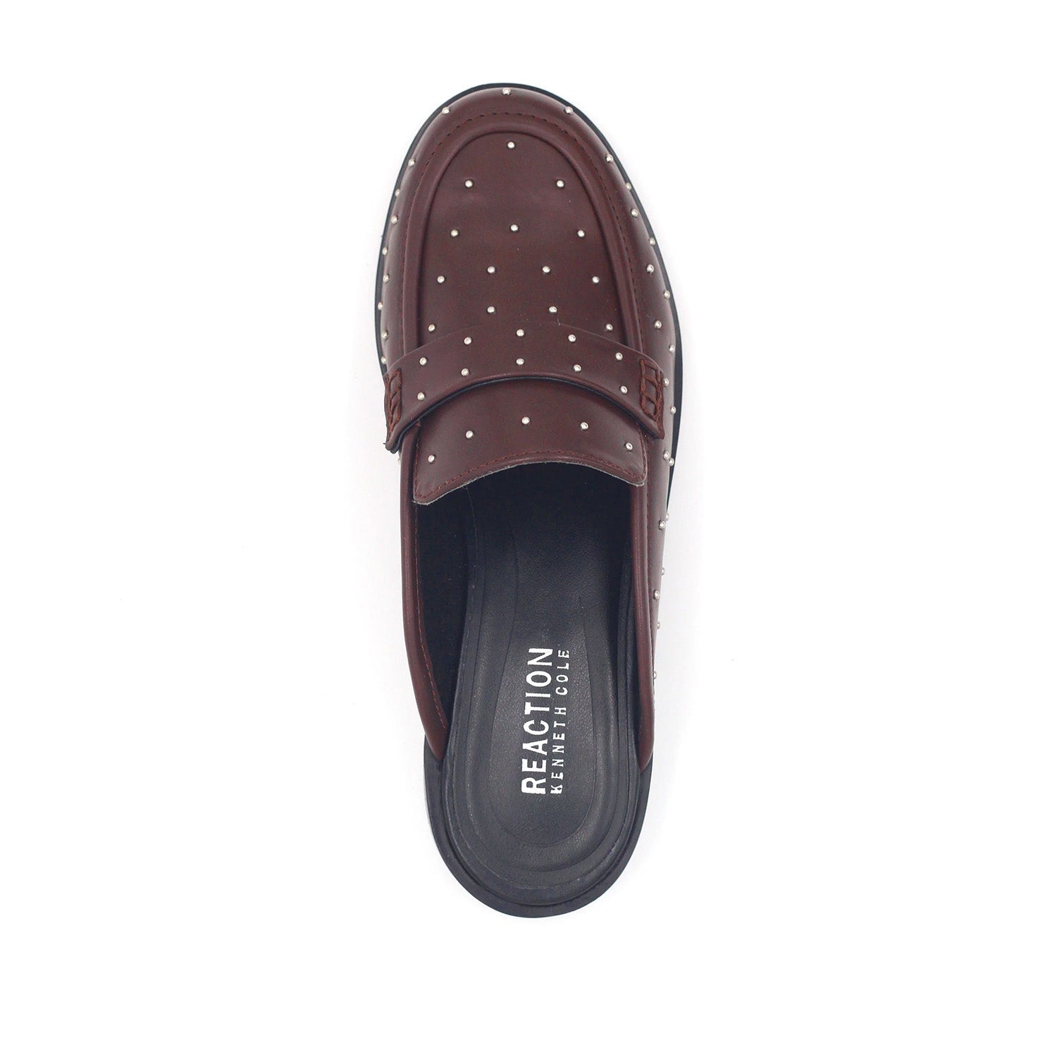 Dark brown slip-on penny loafer mule with an open back, low heel, and embellished studs. 