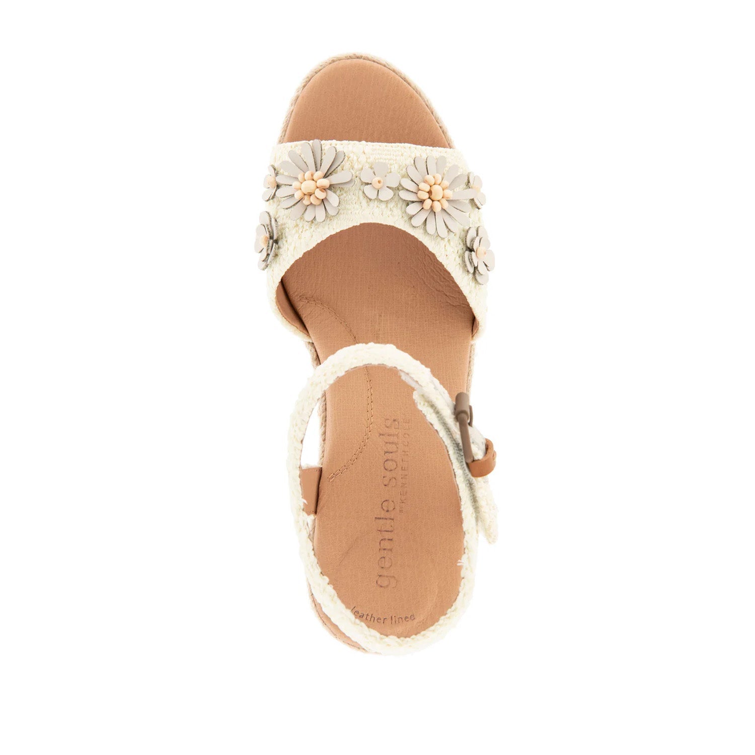 Off-white raffia espadrille wedge sandal with ankle strap buckle, and 3D flower embellishments on toe strap. 