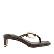 Dark brown toe-post kitten heel sandal with gold-tone hardware on strap