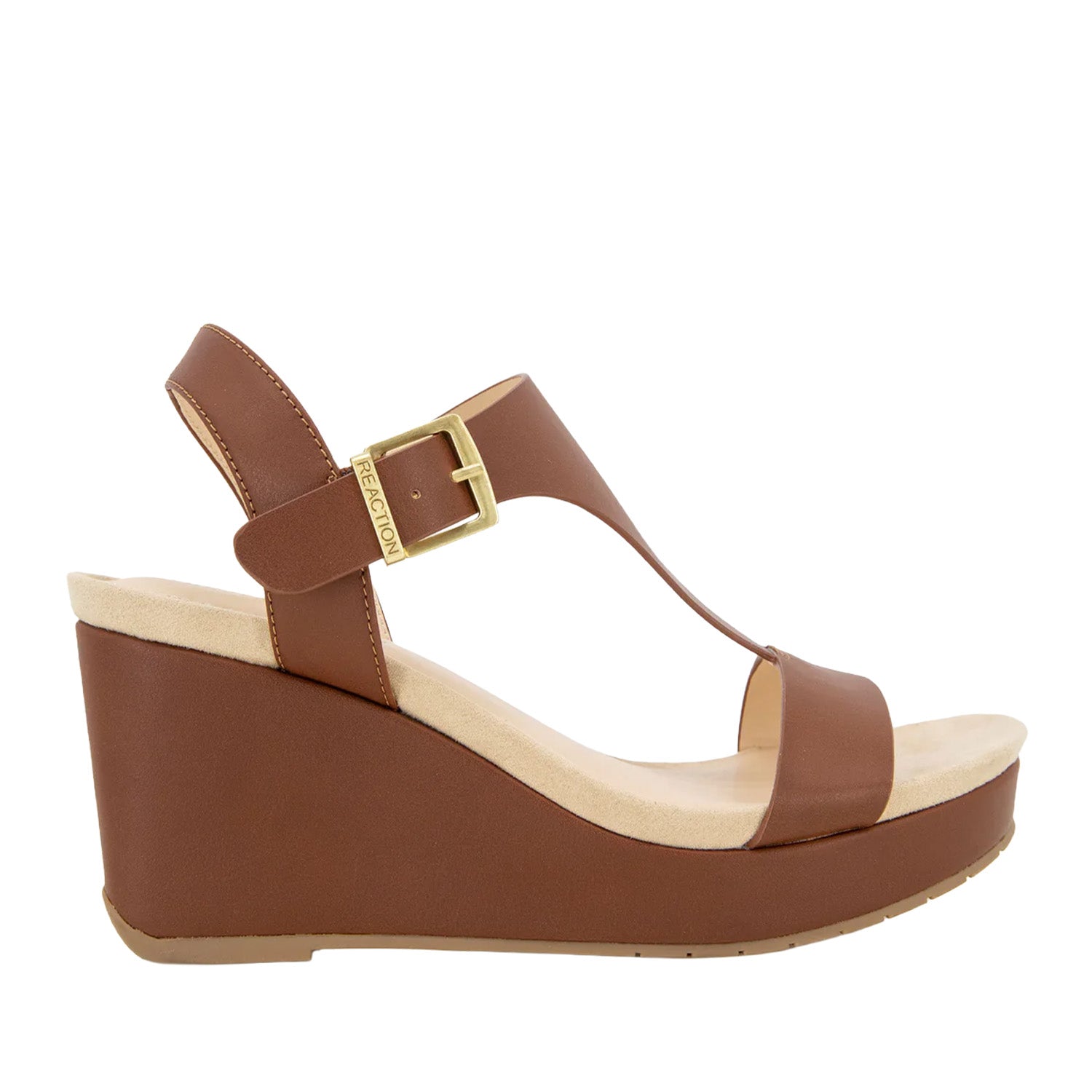 Brown leather espadrille wedge sandal with a t-strap, and ankle buckle. 