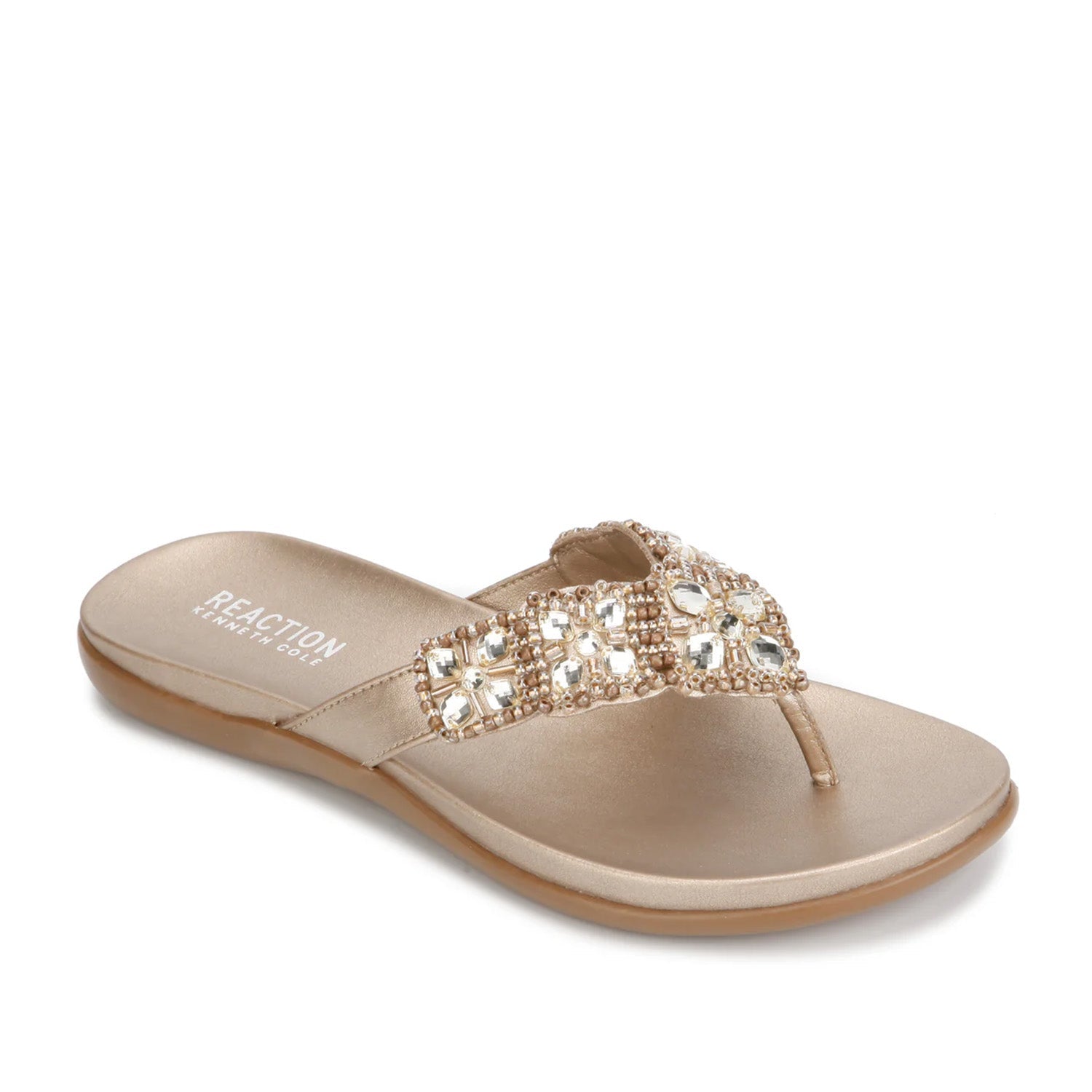 Champagne flip-flop with embellished rhinestone straps. 
