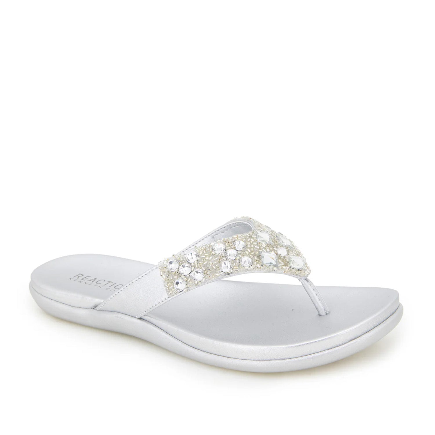 Silver flip-flop with embellished rhinestone straps. 