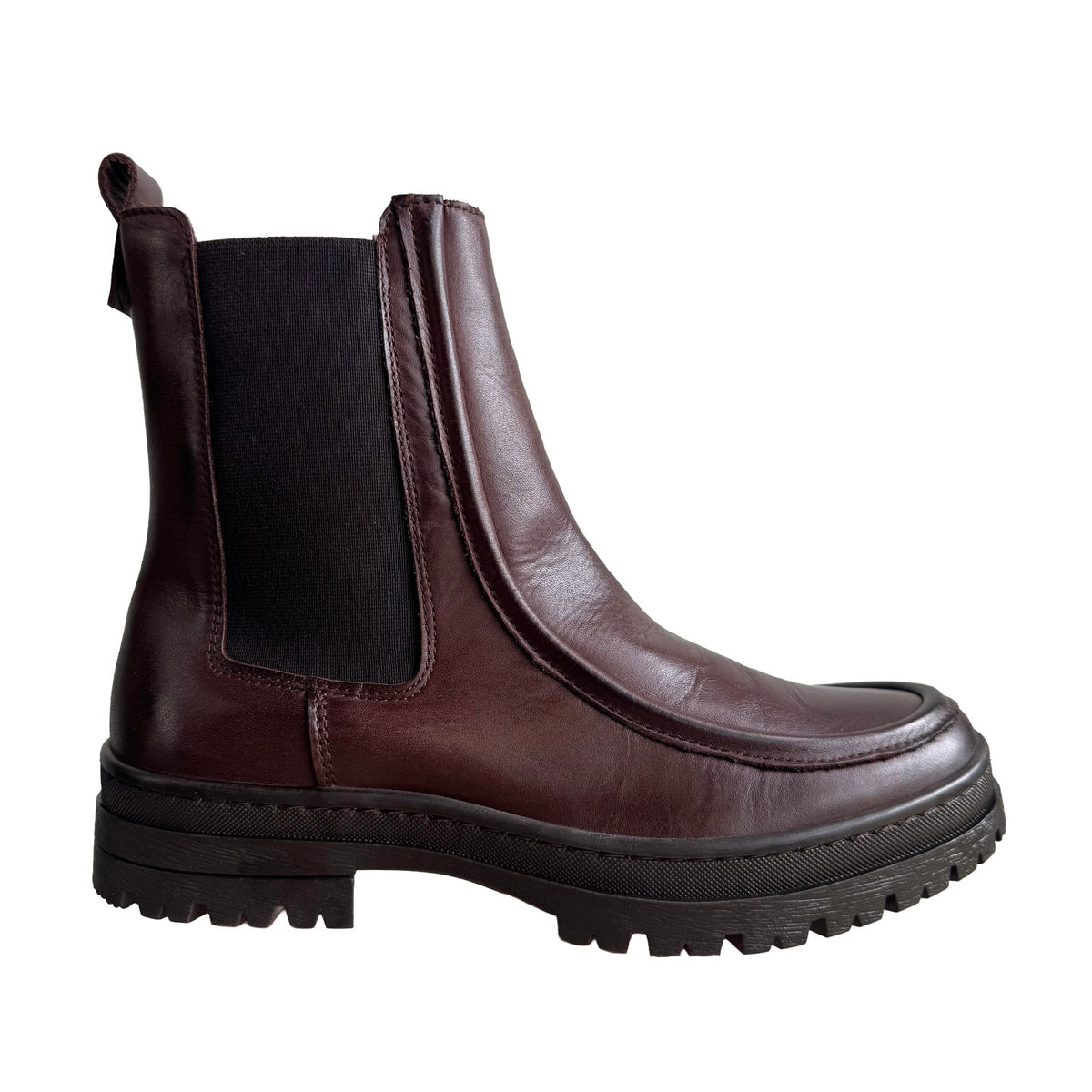 brown leather chelsea ankle boot with platform lug sole on a white background