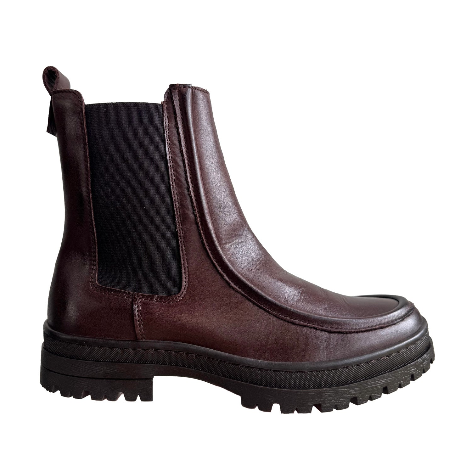 brown leather chelsea ankle boot with platform lug sole on a white background
