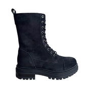 black suede lace-up combat boot with chunky lug sole on a white background