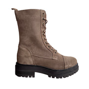 beige suede lace-up combat boot with chunky lug sole on a white background