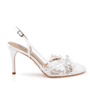 White lace high-heeled shoe on a white background