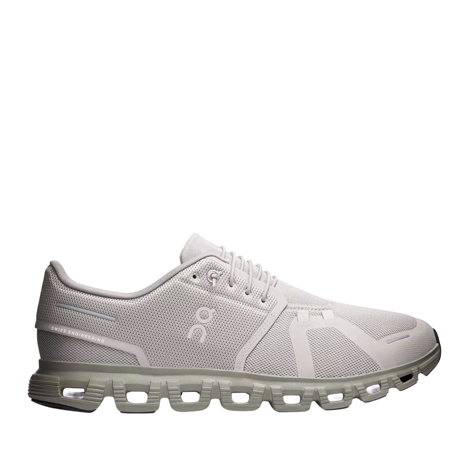 Pale beige green running sneaker on a white background 